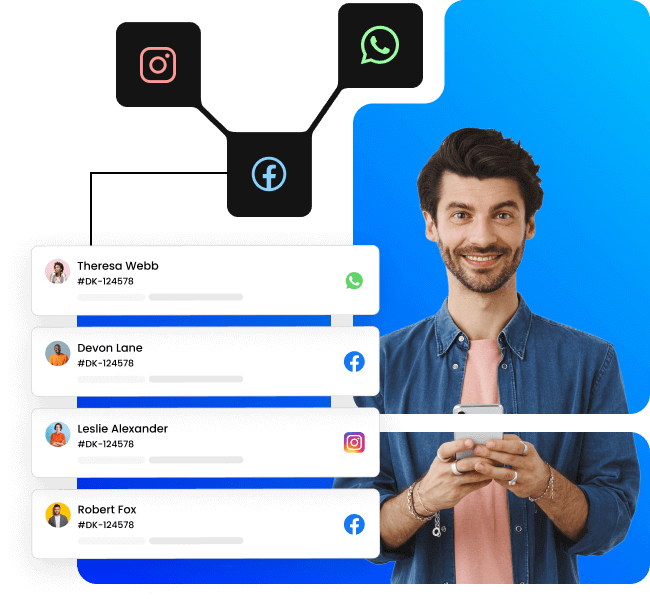 A man is holding a phone with different social media icons on it, seeking customer support.